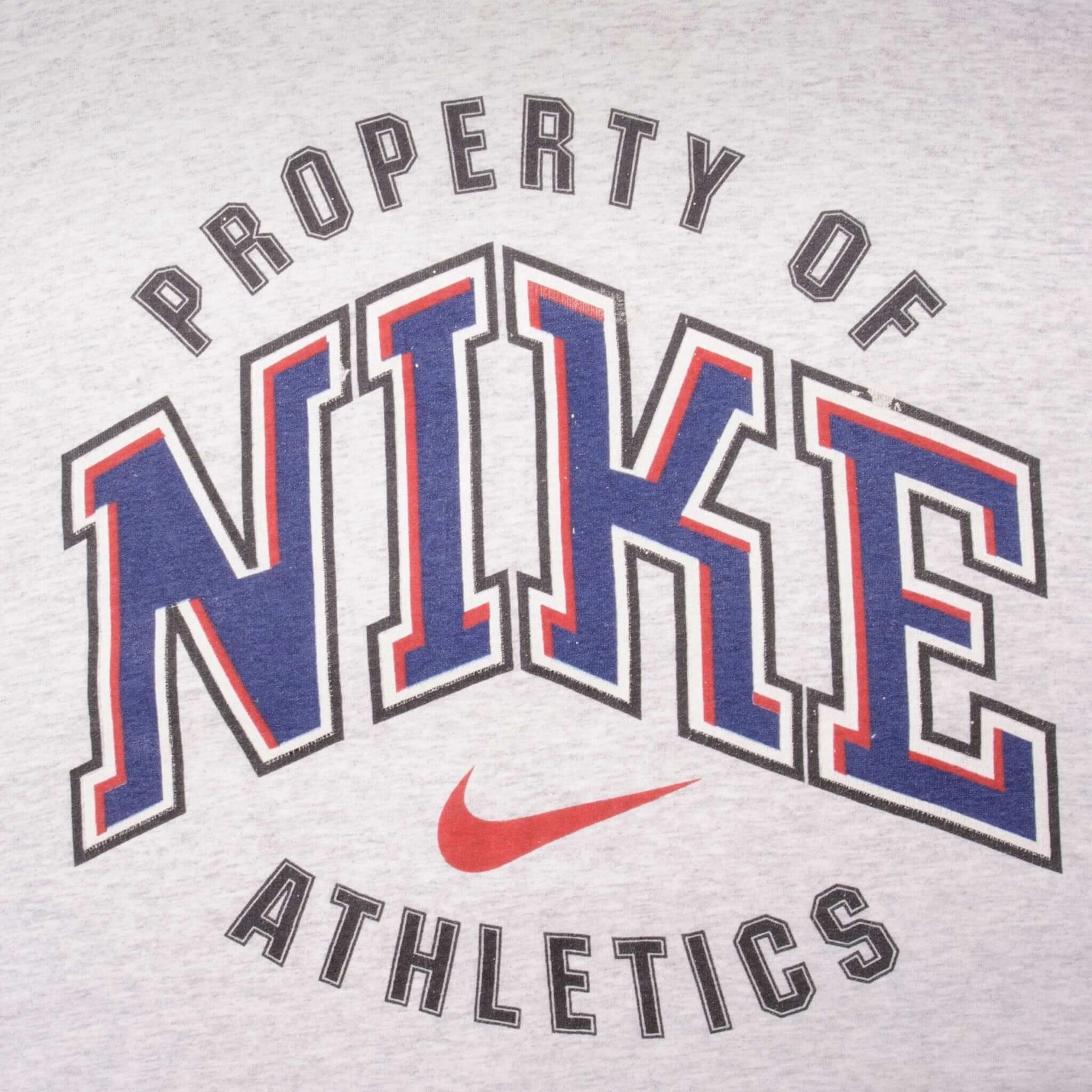 VINTAGE NIKE ATHLETICS EARLY 1990S TEE SHIRT SIZE LARGE MADE IN USA